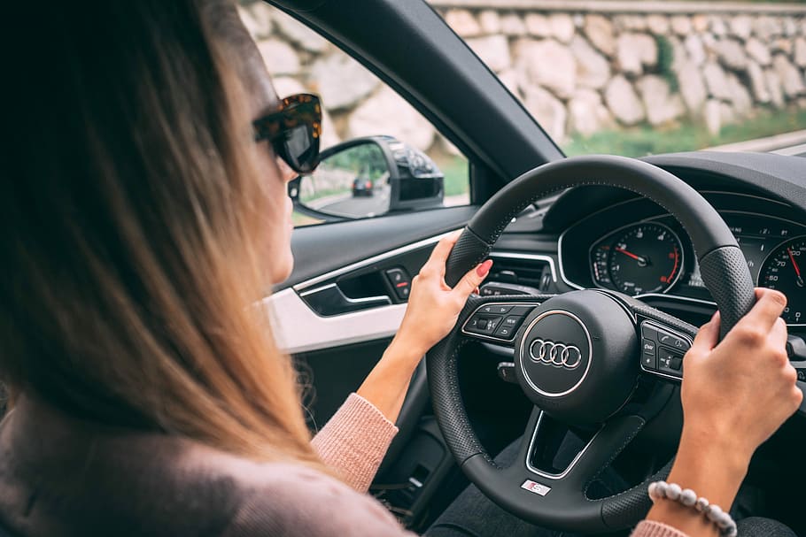 woman-female-steering-wheel-driving