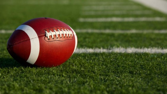 AFI BCS Rankings Football laying on field