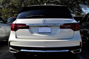 White Acura MDX without a license plate